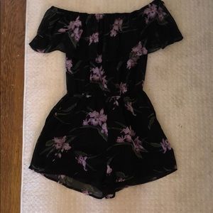 Cute black romper with purple flowers!